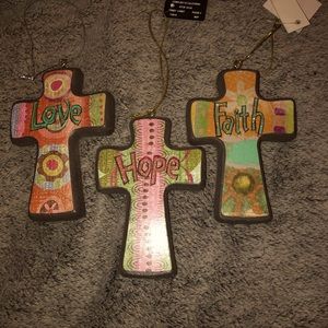 Three hanging crosses